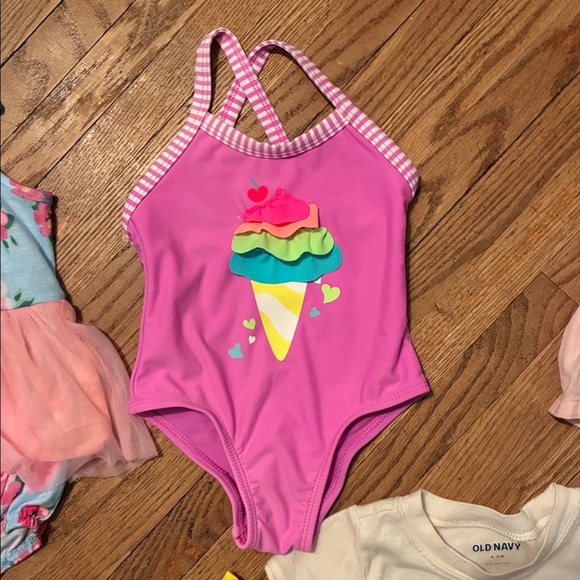 Colorful Baby Clothing Set. Includes Rompers, Onesies, Pjs, Swimsuits, & Dress. - Picture 11 of 16
